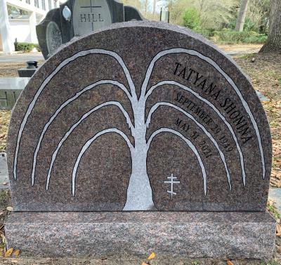 mahogany granite headstone with tree design